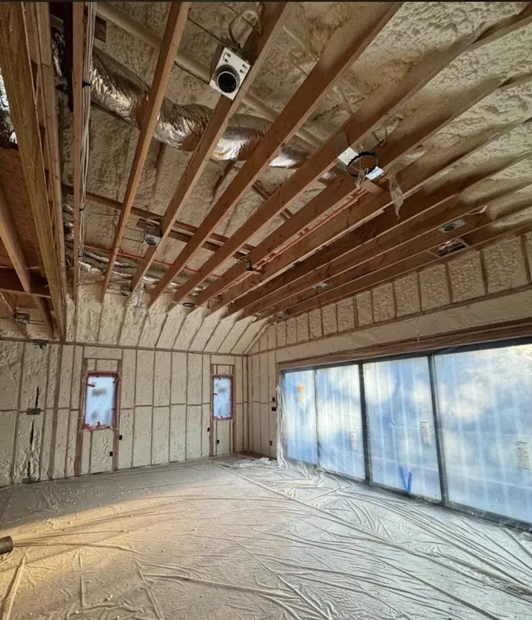 Interior walls and ceiling insulated with spray foam during new construction in Yucaipa